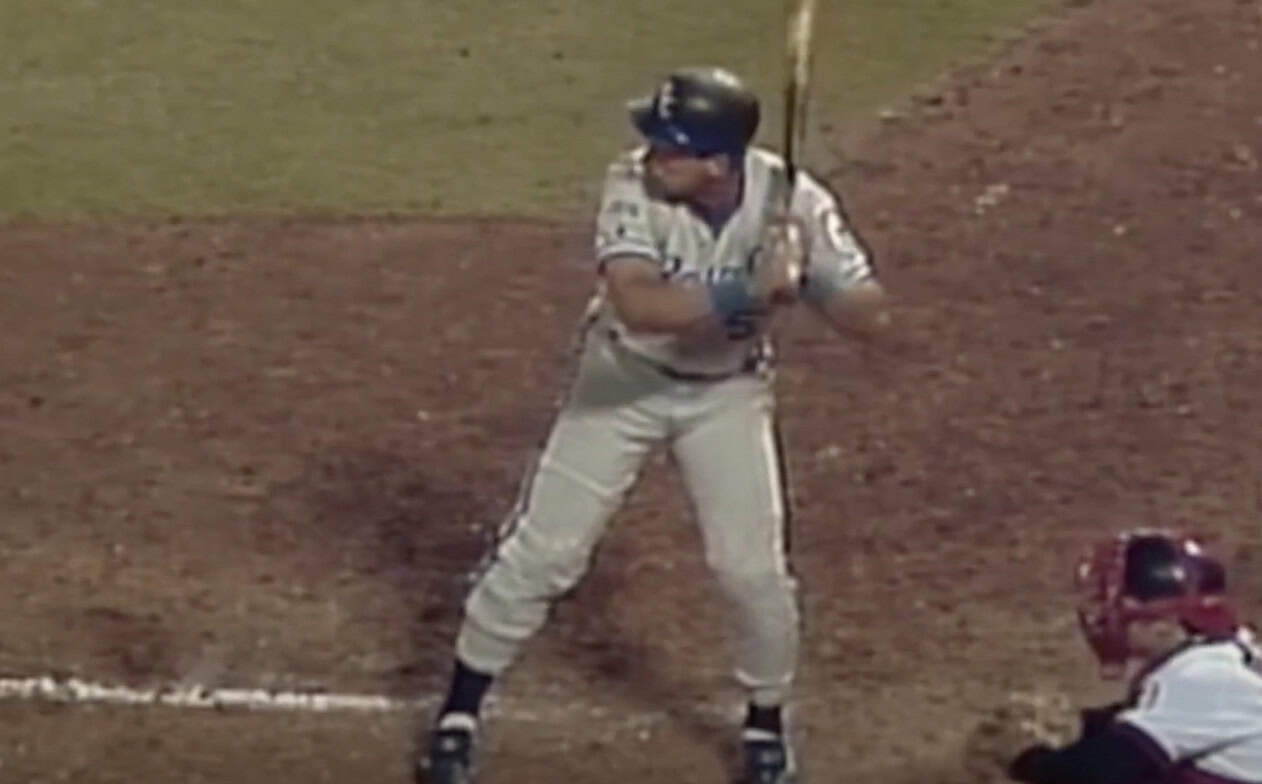 George Brett swings during a game, showcasing his skills as Kansas City's star player.